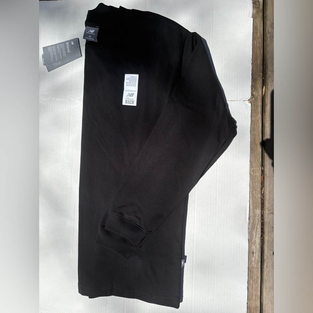 New Balance 574 Classic Black Long Sleeve Tee.